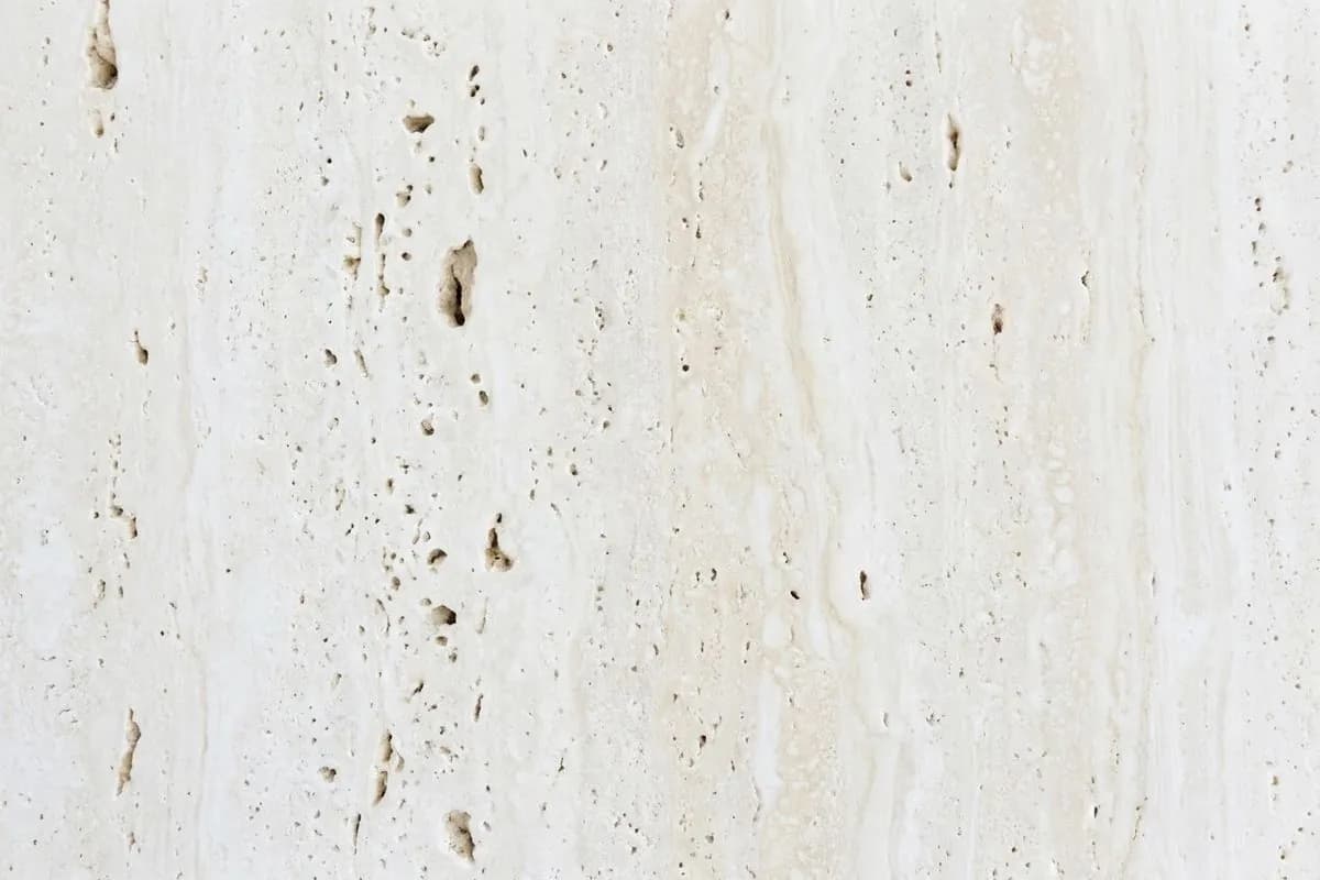 Beige travertine with open pores
